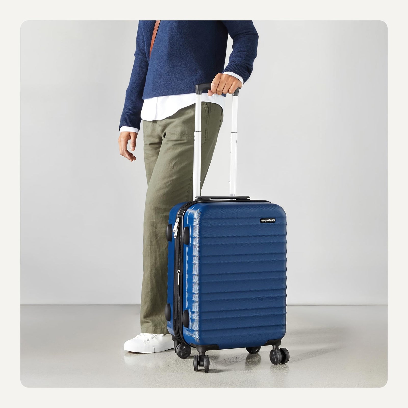 Amazon Basics Hardside Spinner Luggage- 21 inch (55cm), Material: ABS, Navy Blue