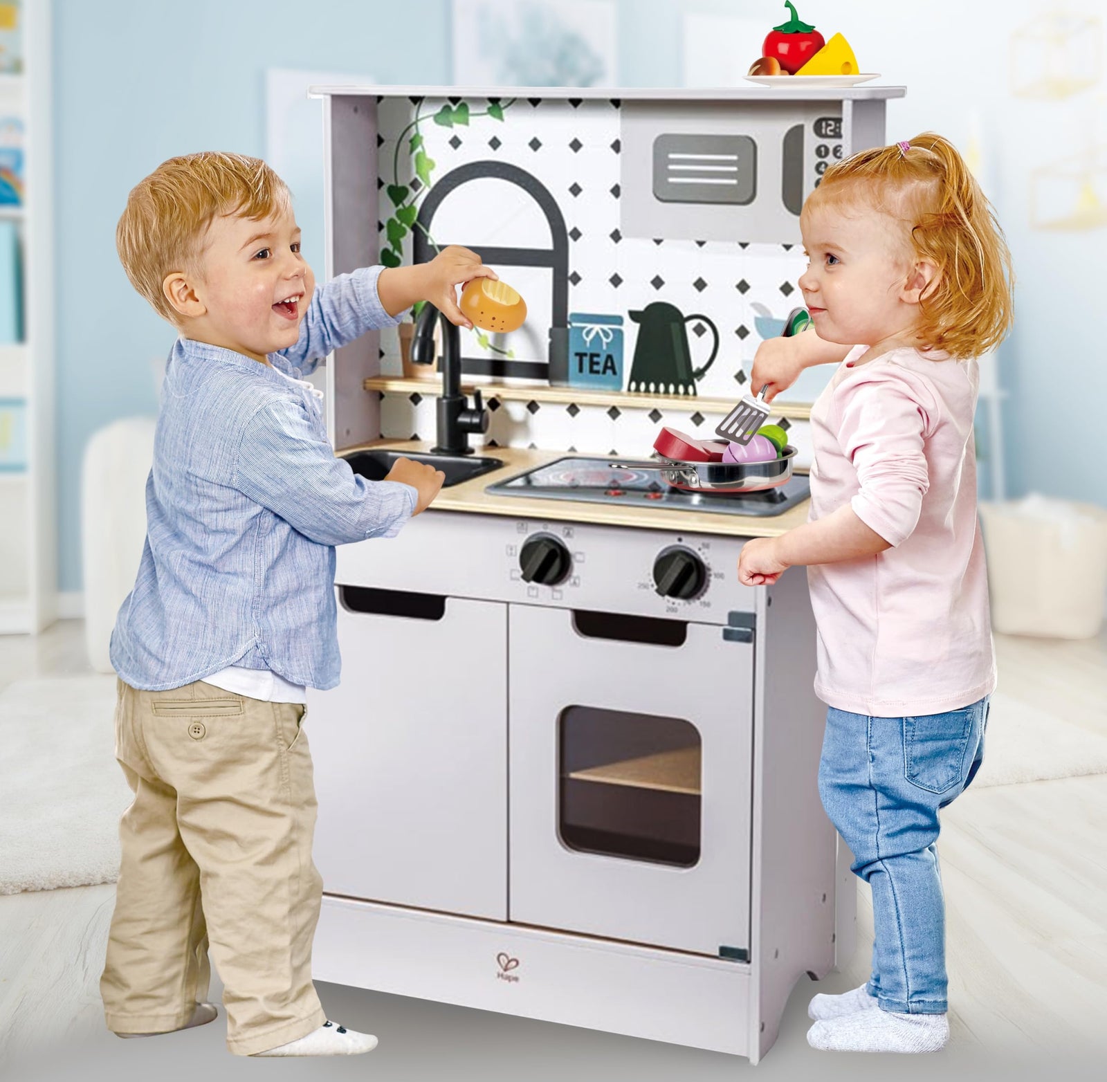 Hape Light and Sound Kitchen Playset | Stainless Steel Accessories with Sound Making Microwave Oven and Sink | Toddler Cooking Pretend Play Wooden Kitchen | Role Play Toy Set for Kids